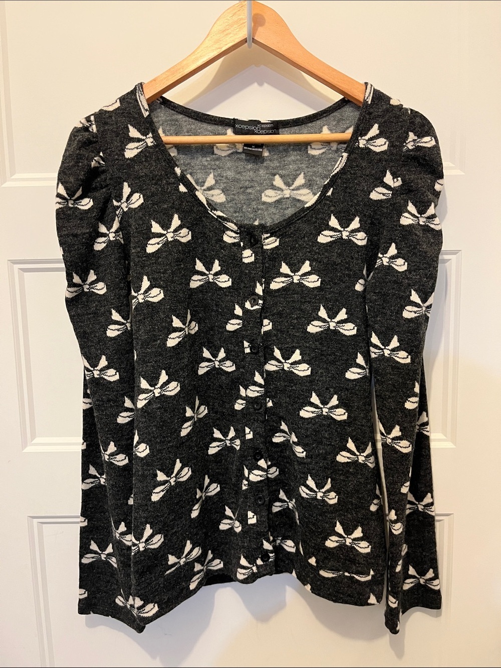 Black Puff-Sleeve Cardigan Top with Ivory Bow Motif - Picture 2 of 6